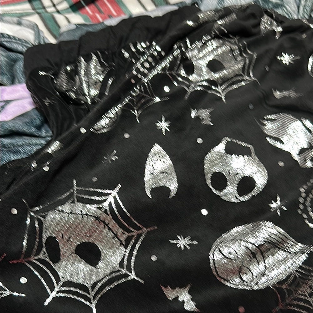 Nightmare Before Christmas black and silver pajama pants. These are a women’s so